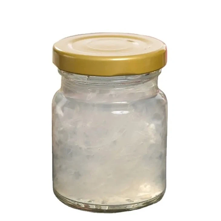 bird's nest bottle glass with yellow lid