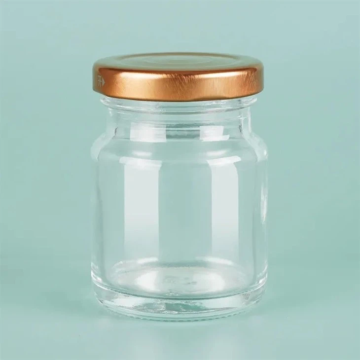 bird's nest bottle glass with gold lid